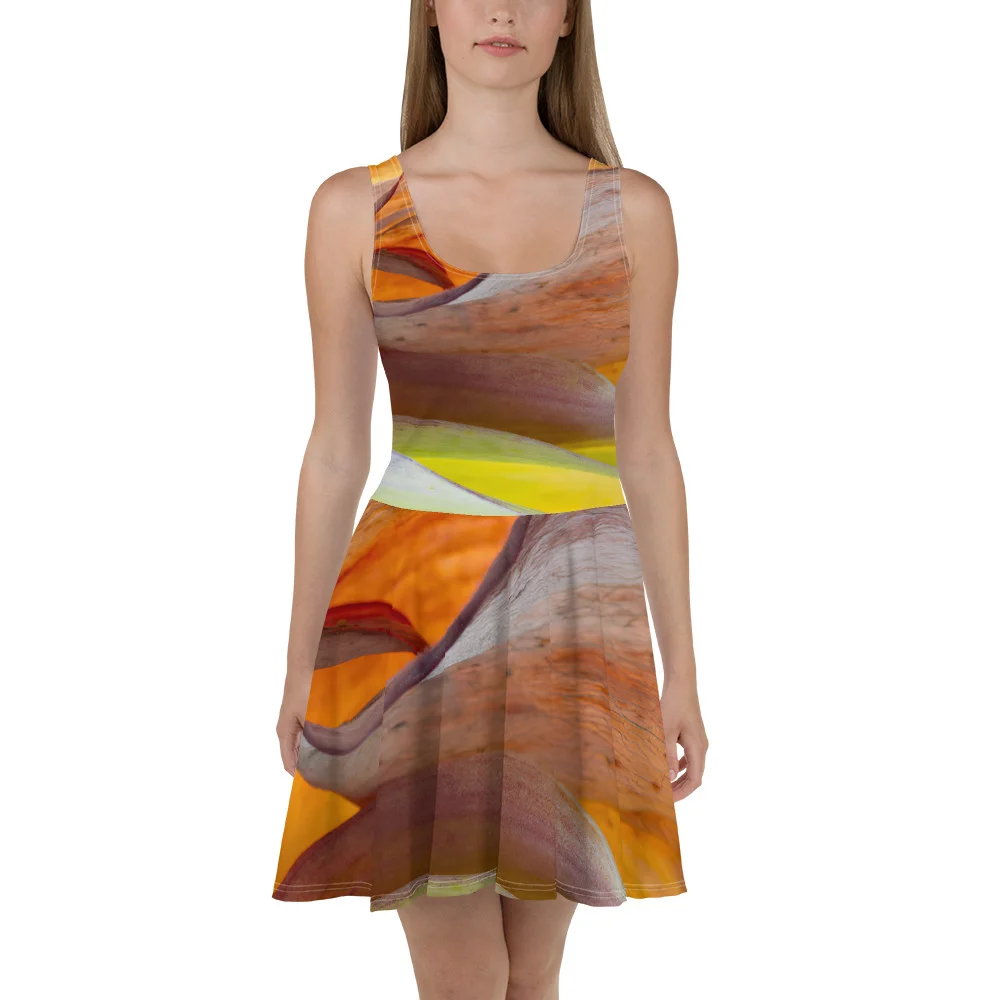 Robe patineuse :Le tissu doux et la jupe évasée lui donnent une touche d’élégance, qui met en valeur sa coupe délicate et ses couleurs chatoyantes. célébrant la féminité parisienne avec élégance et sophistication. Cette pièce est le choix parfait pour toutes vos occasions estivales.